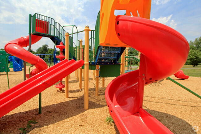 There are multiple slides at the Ledgeview Elementary School playground in Macedonia.