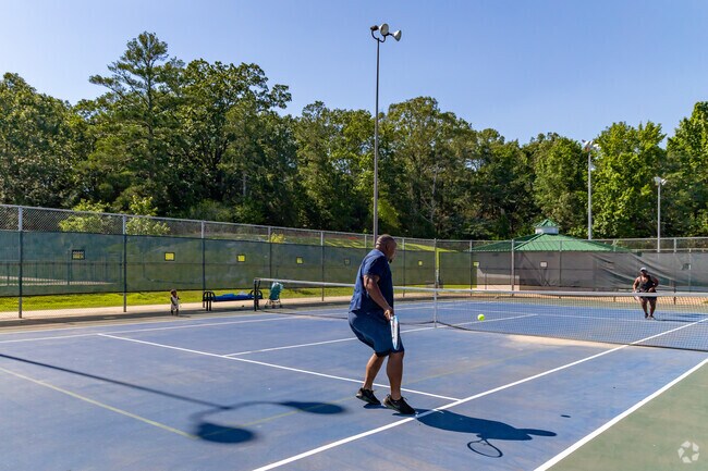 Work on your backswing on one of Olive Branch City Park's five lighted tennis courts.
