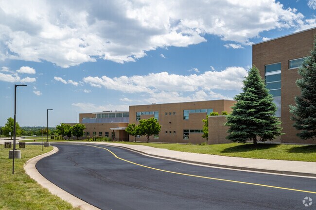The dropoff and main building at Wayne Carle Middle School in Broomfield, Colorado.