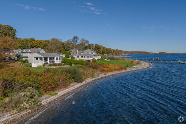 A row of shoreside homes in Warwick Neck is a in an exclusive area with optimal views.