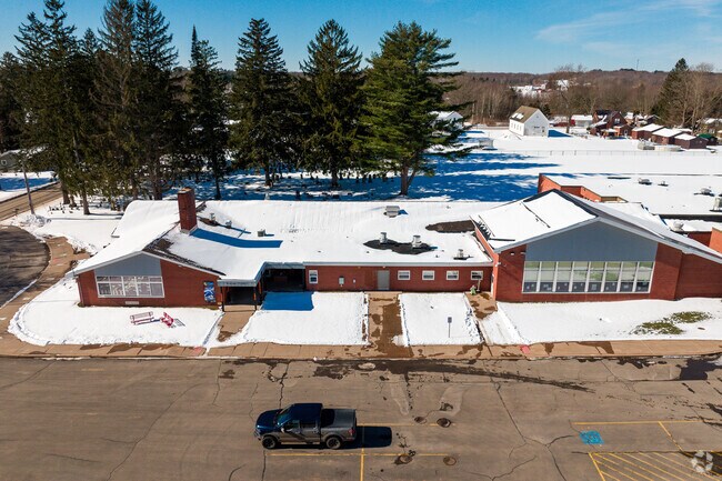 Palermo Elementary in Palermo's parking lot and main entrance.