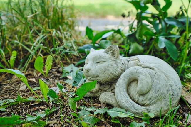 This cat decoration embodies the quiet, cozy feeling of Liberty Glen's suburban streets.