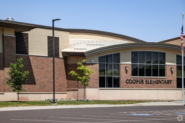 Cooper Elementary has modern 2019 facilities, but first opened for Wisconsin students in 1902.