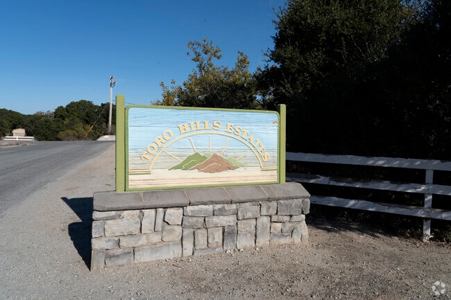 Colorful signage welcoming homeowners to Toro Park Estates.