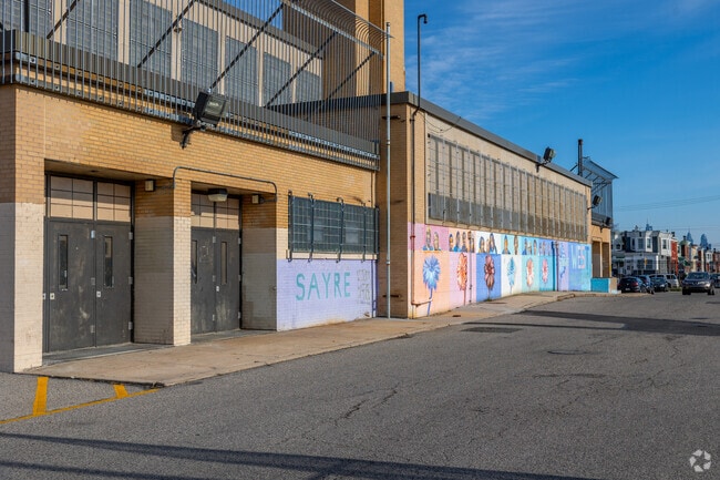 Murals line the exterior walls of William L. Sayre High School.