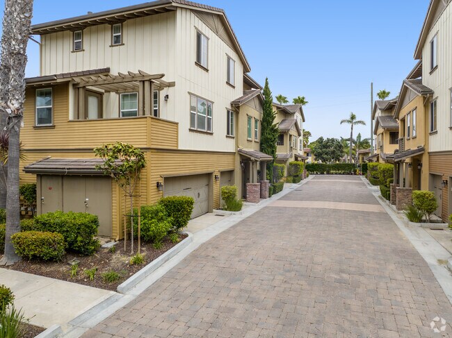 Townhome communities in the Via Marina neighborhood feature garages attached to each unit.