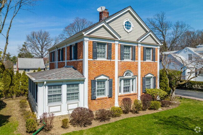 You'll feel right at home here in Manhasset living in grand, brick exterior homes.