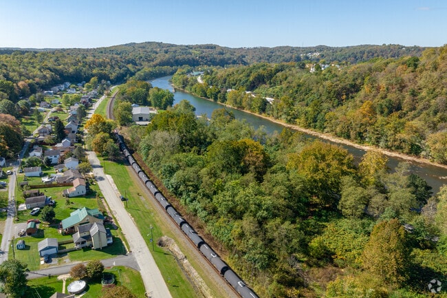 Trains pass along the Allegheny River through the neighborhood of Allegheny Township.