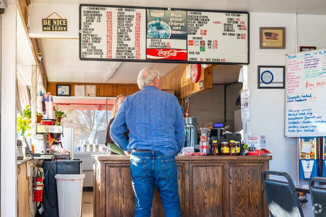 Locals order burgers and shakes from the American Drive-In.