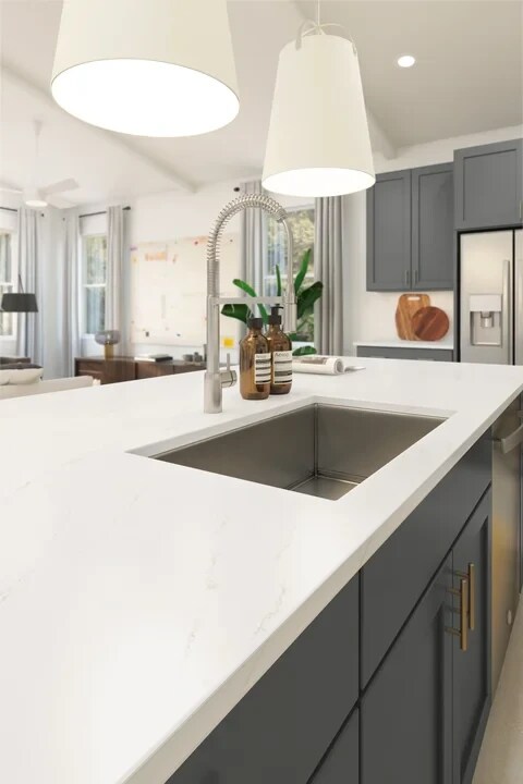 Kitchen with pendant lighting over island