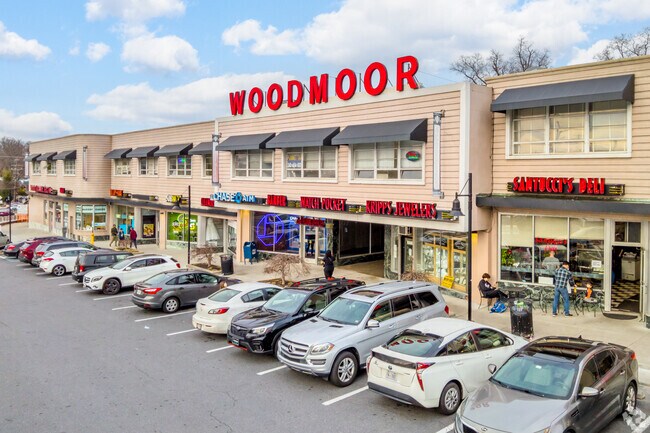 Woodmoor Shopping Center offers casual dining and shops near South Four Corners.