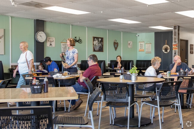 Hearty breakfasts and a cozy atmosphere keep locals coming back to Grumpy Egg Cafe, making it a beloved spot just minutes from Concord.