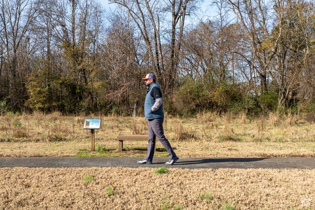 You can take an evening walk on the paved trail at the Town Creek Park in Waxhaw.