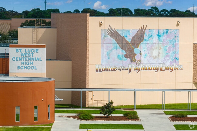 A pylon and spirit mural decorates St. Lucie West Centennial High School.