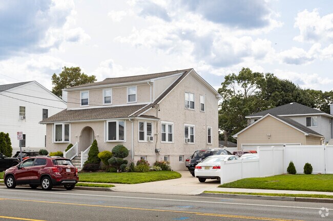 Some of the colonial style homes in Copiague, NY have detached garages.
