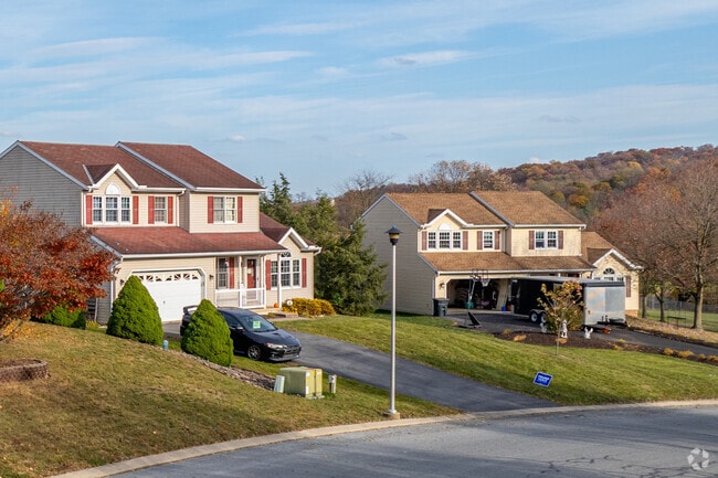 New traditional homes often come with attached garages for secure parking in East Hanover.