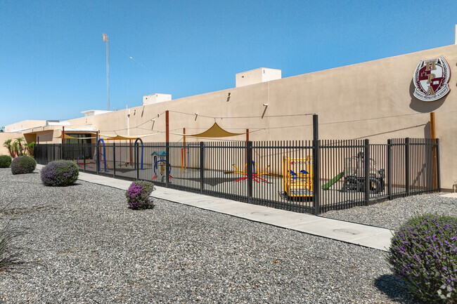 Students at Harvest Preparatory Academy in Yuma engage in daily activities that strengthen reading, writing, and phonics skills.