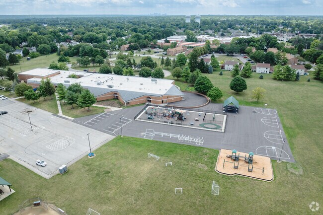Sutter Park Preschool features a fenced playground.