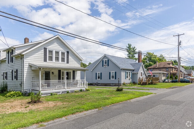 Several houses in Lincoln Park can have a saltbox-style flair with angled roofs.