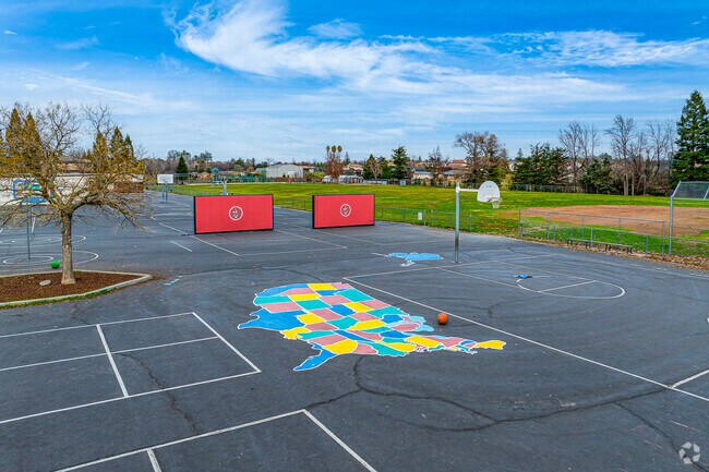 United states map pops color off blacktop at Oakhills Elementary School.