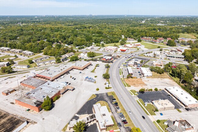 Oldham Farms blends forested land with nearby retail options.