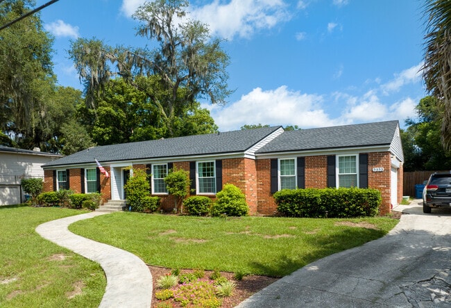 Brick ranch homes with neat landscaping stand out in University Park.