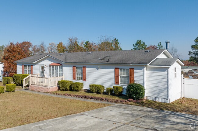 Neatly landscaped yards are a common sight in Pine Ridge.