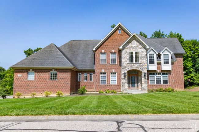 New Traditional homes with spacious yards populate the subdivisions of Cotillion Village.