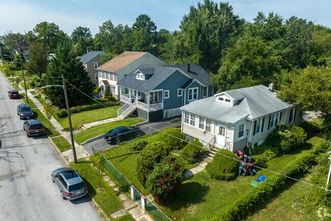 Cottages, bungalows, and colonials sit side by side on this street in Kenilworth Park.