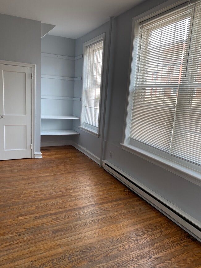 Storage closet and additional shelving being installed in Livingroom