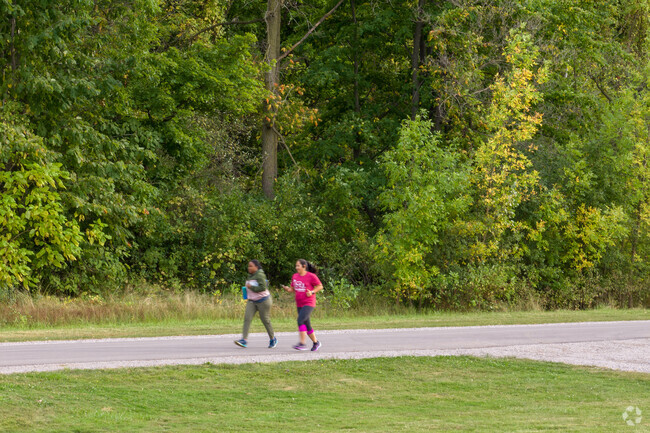 Southeast locals enjoy an afternoon spent jogging at Hoyt Park with friends.