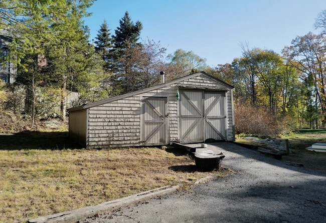 detached garage with wood stove