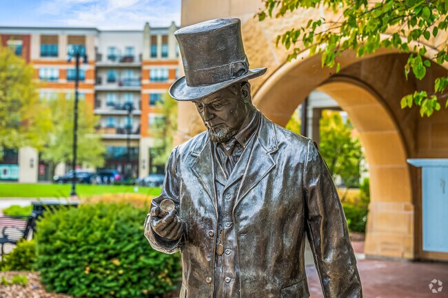 The statue of Senator John Humphrey is located by Metra train station in Orland Park, IL.