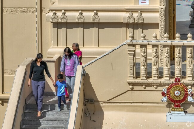 Citrus Park neighbors leave the Hindu Temple of Florida.