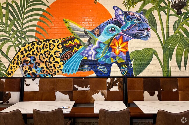 Colorful wall art welcomes you at Casa Blanca Mexican Restaurant.