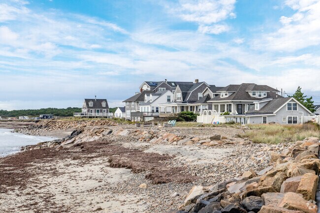 Rocky barriers protect homes on West Beach Road in Great Neck from coastal weather.