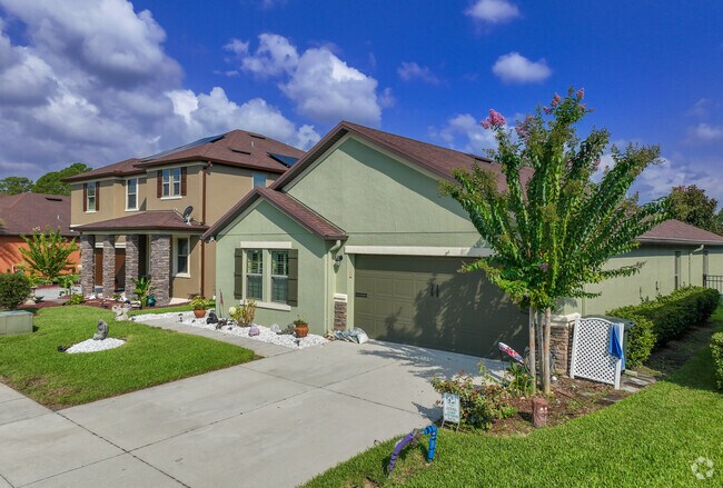 Tuscany Woods has one and two story contemporary homes, some with waterfront views.