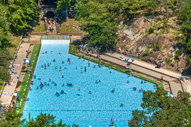 The Bear Mountain Pool is the perfect summer escape for families seeking relaxation in the sun.