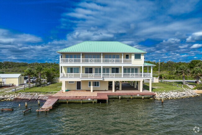 Oak Hill has a number of contemporary condo type 2 and 3 story waterfront homes.