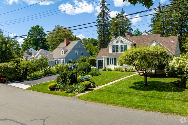 The homes in Purchase are spread far apart with lush gardens and a variety of trees.