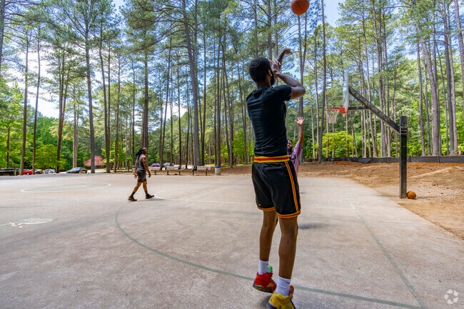 Silverwood locals can play a game in the serene setting of Reedy Creek Park's basketball court.