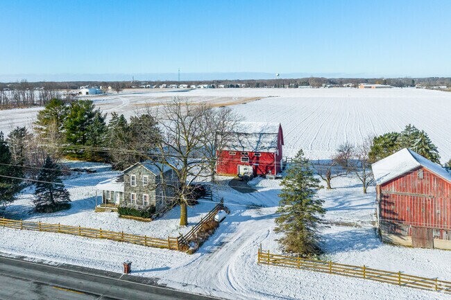 A farmstead with several outbuildings in Mason.