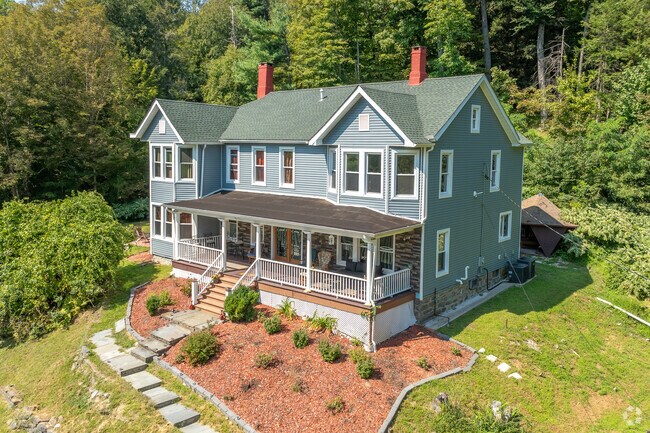 Large contemporary designs hidden behind tree lines can sell for over $1 million in Rosendale.