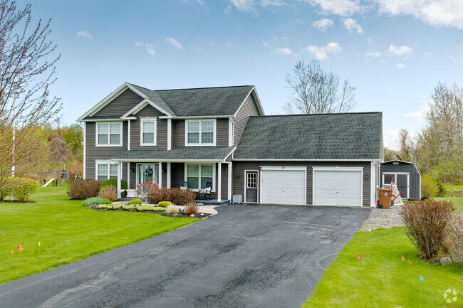 Colonial style homes in Parma typically sit on large lots with a median listing price of around $360,000 depending on size and condition.