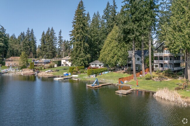 Experience luxury and comfort in these beautifully designed Lake Ketchum waterfront homes.