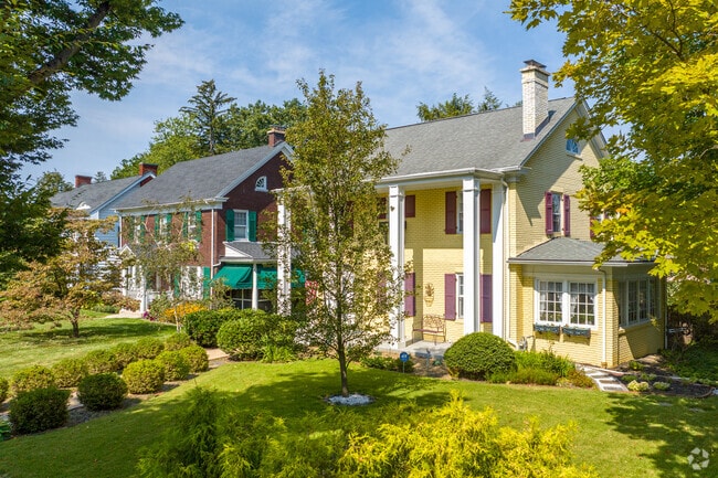 Large columns running the entire facade mark the Violet Hill Greek Revivals.