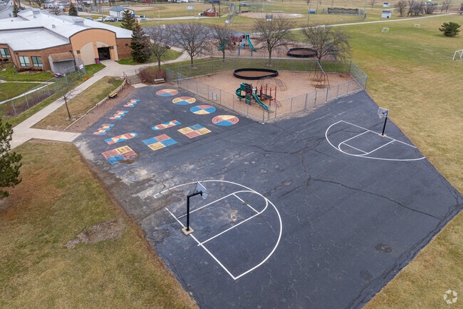 Ossian Elementary School has a large playground for it's students.