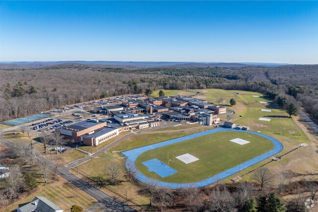Lewis S. Mills High School, was founded in 1962.