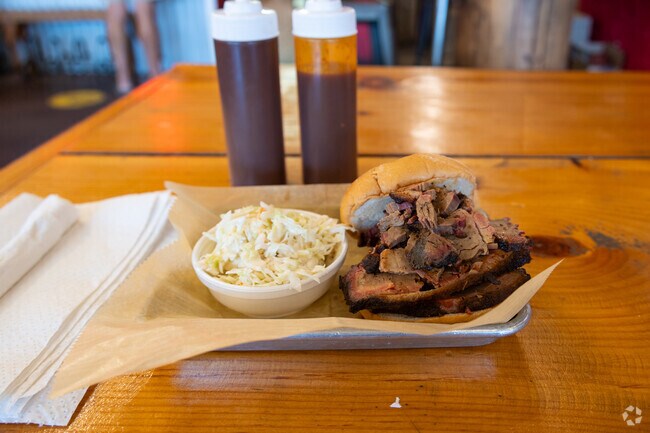 The Smoked Brisket Sandwich is a fan favorite at Spanx the Hog BBQ Restaurant.