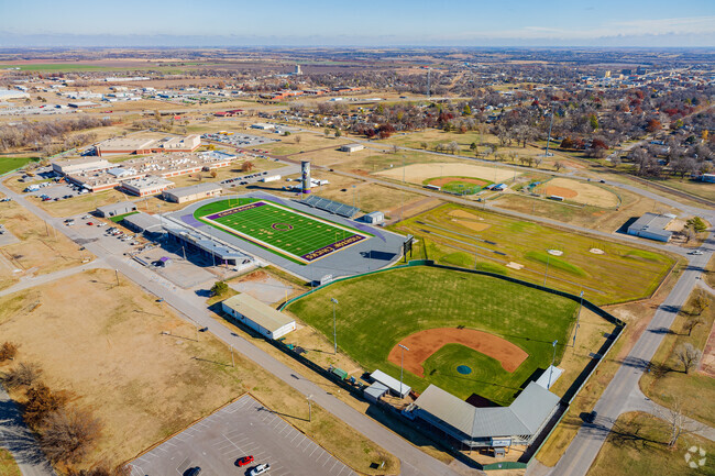 Sunny aerial view reveals the softball field and Memorial Stadium